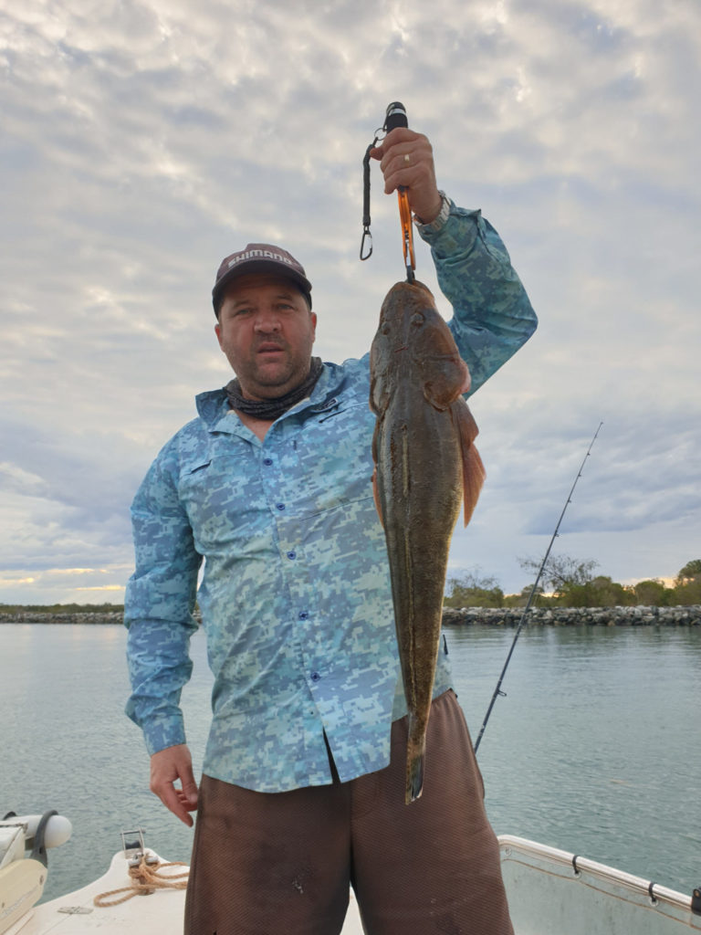 Michael Gallagher on the Burnett River with a flathead.