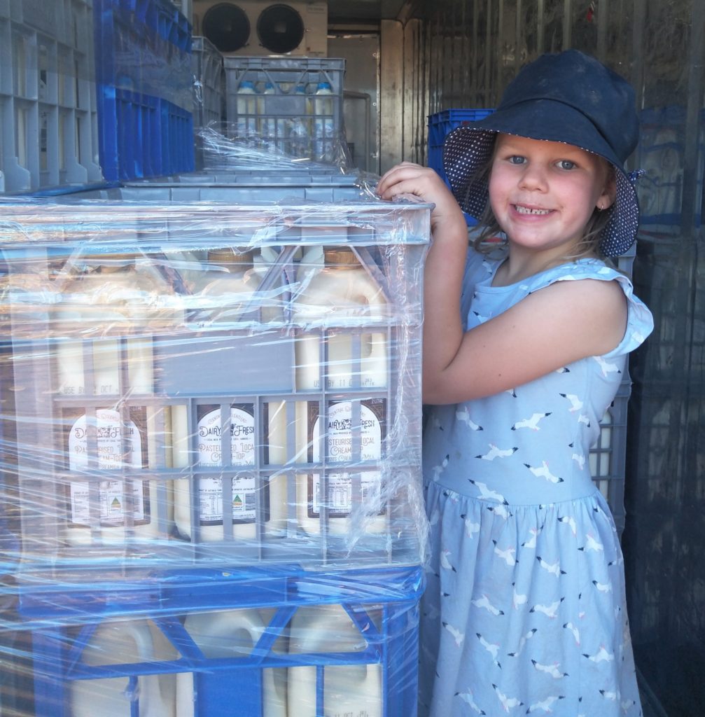 Charlotte in cold room, keeping an eye on the delicious milk!