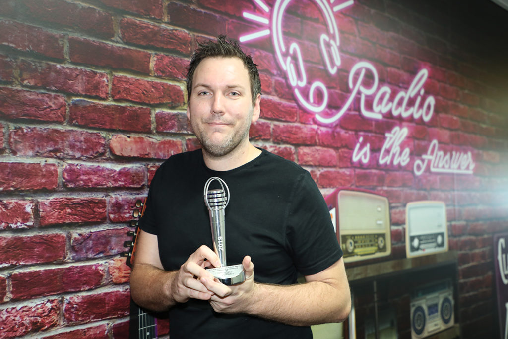 Brendan Egan with the Best Achievement in Production award.