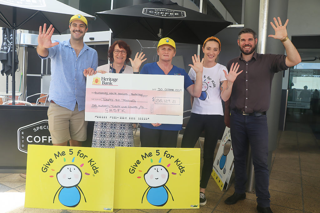 Give Me 5 for Kids: Triple M's Nik Stuart, Bundaberg Health Services Foundation Anne McWhirter, children's ward unit manager Deborah Spry and Triple M's Amber Wheatland and Nathan Bedford.