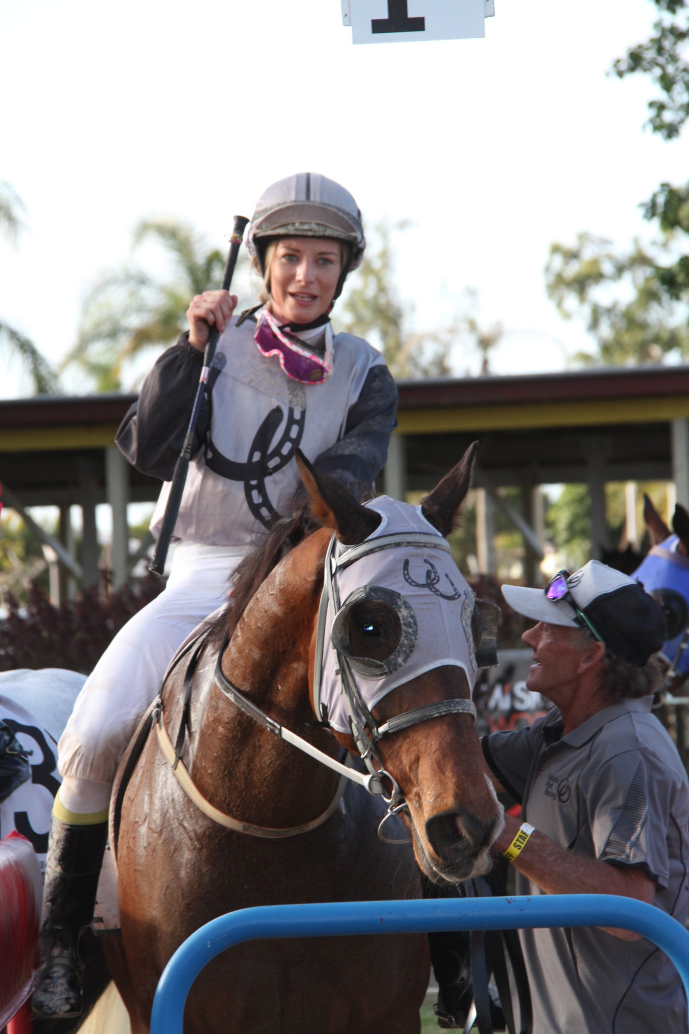  Elusive Element with jockey Shannyn Stephan and trainer Kym Afford after their victory in the Bundaberg Cup