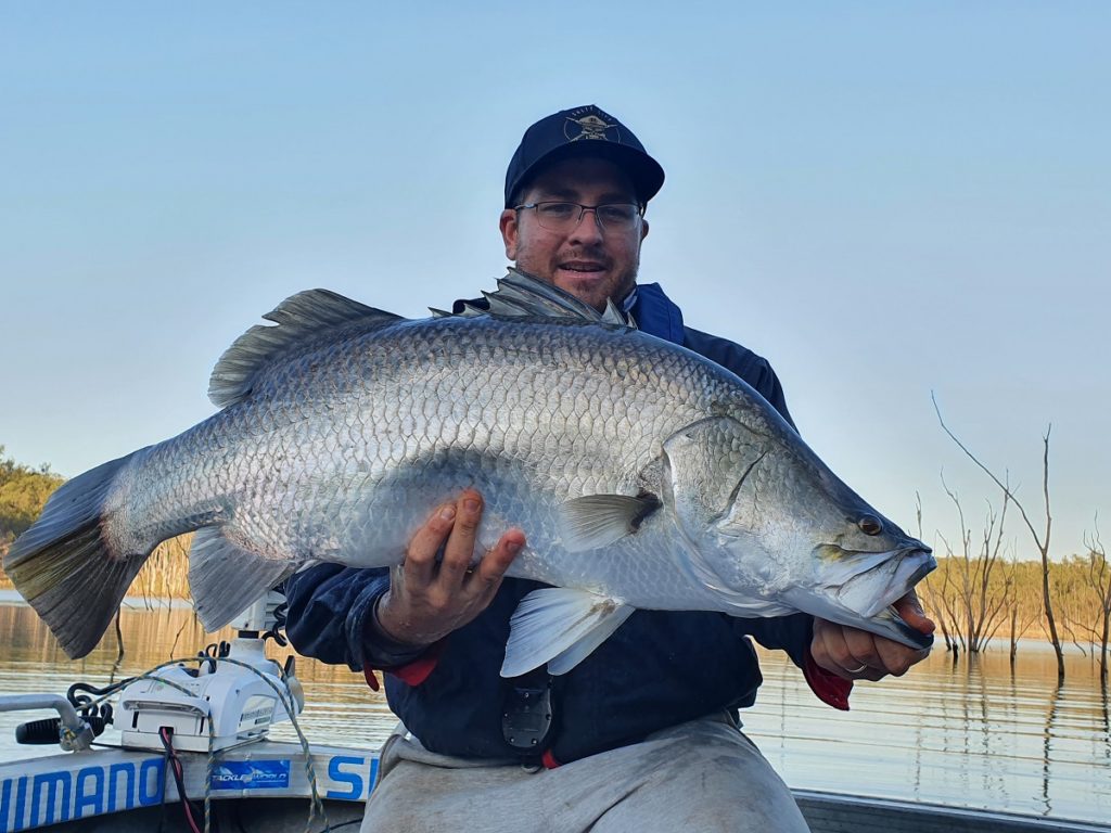 Nathan Sutton with a Monduran Barramundi