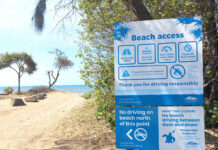 Moore Park Beach driving restricted vehicle access sign