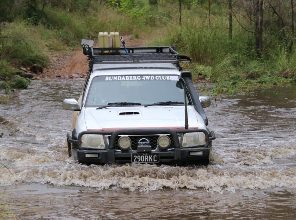 Ross Argent on one of the many creek crossings. kroombit tops
