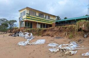 Significant erosion has exposed the foundations of a building on the Moore Park Beach Foreshore.