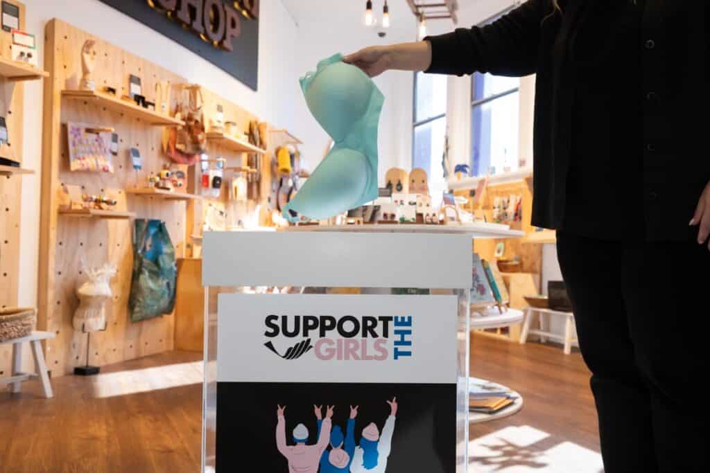 support the girls donation box at gallery