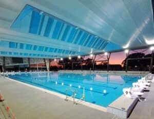 Bundaberg Aquatic Centre filled pool at sunset.