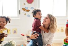 Young children and caregivers at a playgroup