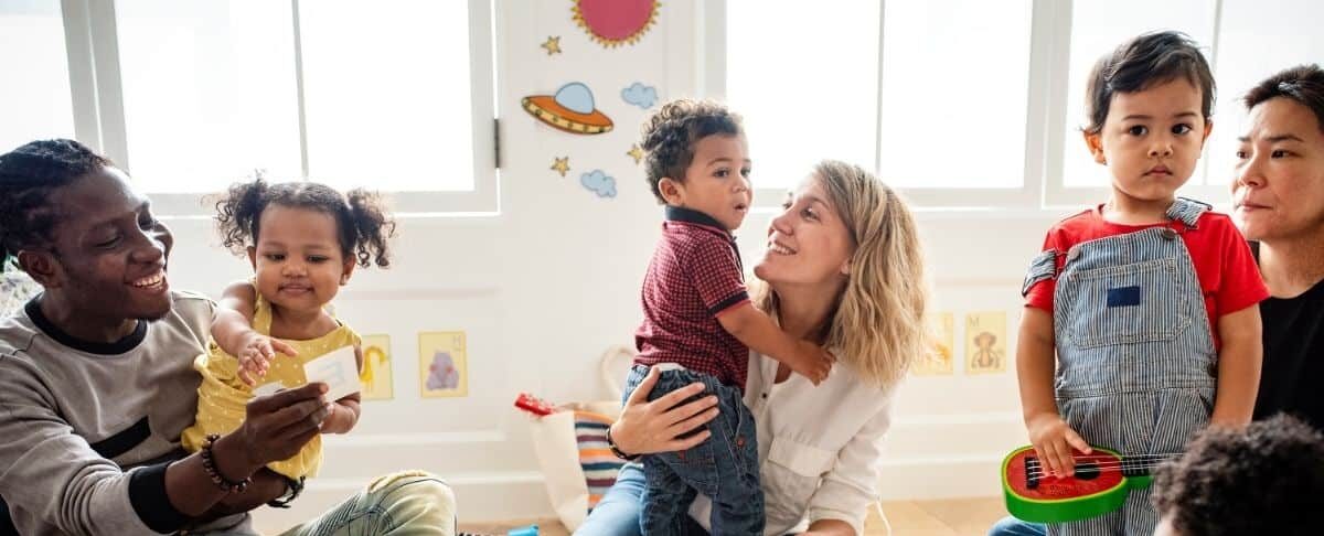 Young children and caregivers at a playgroup
