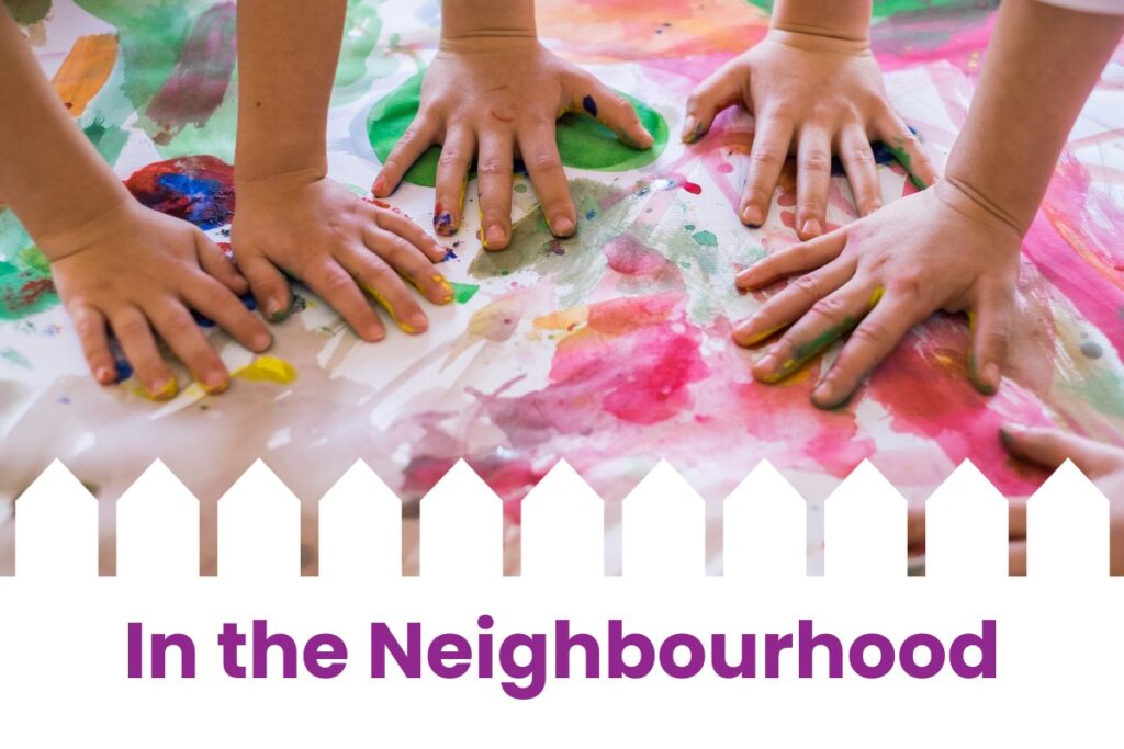 Children's hands in colourful paint