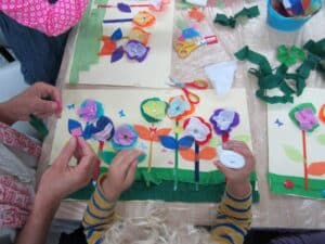 Children create spring crafts.