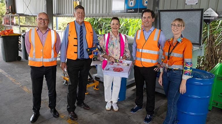 Group holding assortment of items containing embedded batteries.