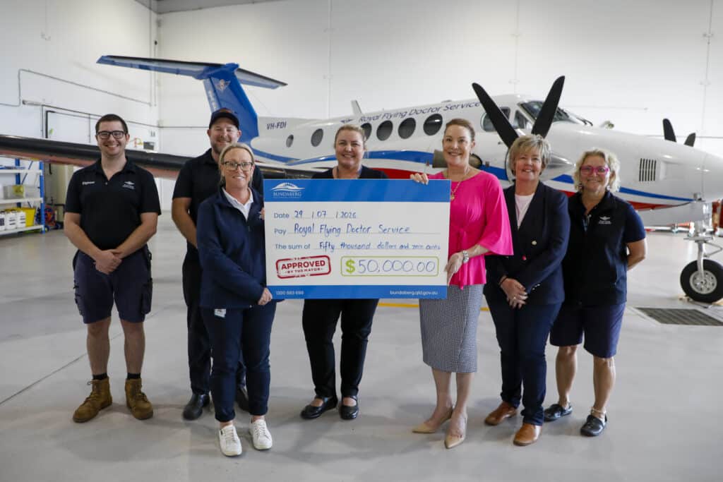 Royal Flying Doctor Service donation: Luke, Cav, Robyn, Shannon, Mayor Helen Blackburn, Cr Deb Keslake and Fenella.