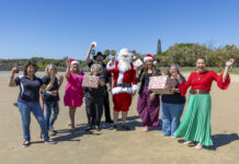 Mayor’s Christmas Appeal launches with Auswide support and community spirit Mayor Helen Blackburn, Appeal's charity partners and major sponsor Auswide Bank at Nielson Beach.