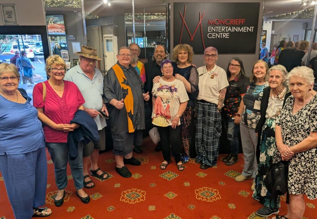 Gin Gin Neighbourhood Centre seniors bus trip participants with What's New Pussycat performers.